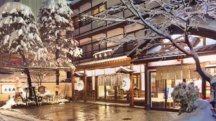 Naraya, a long-established Japanese-style inn with a rich historical atmosphere, located in the famous Yubatake area of Kusatsu Onsen.